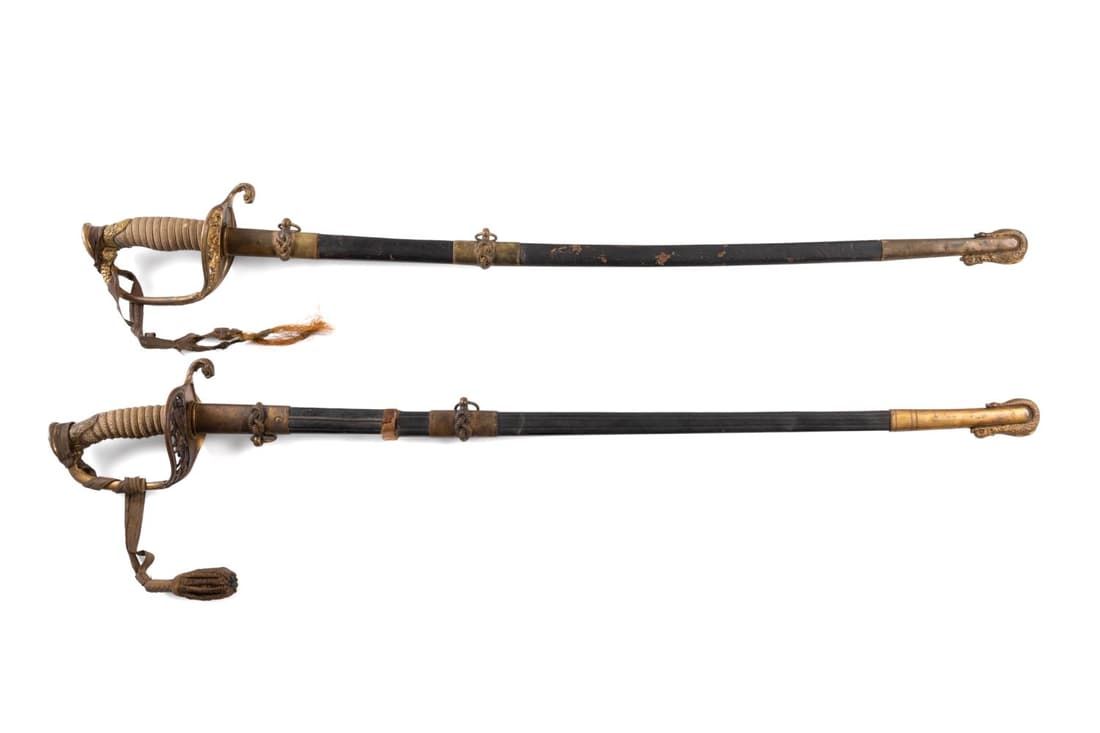 TWO NAMED M1852 US NAVY DRESS SWORDS: Two named m1852 US Navy dress swords, the first made by Harding Uniform and Regalia Co, Boston Mass, engraved on the blade for Lieutenant E. W. Haskell, pommel top with an eagle and sides lined with o