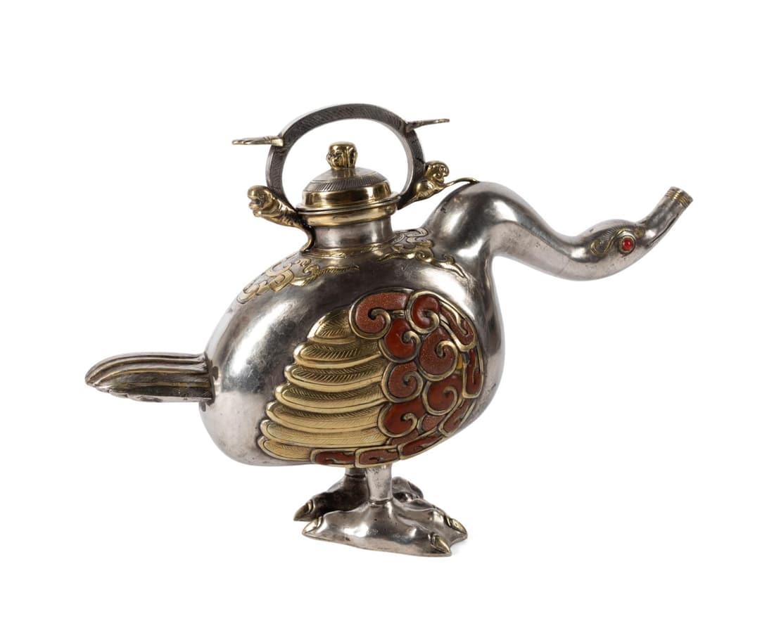 CHINESE SILVERED METAL & STONE FIGURAL TEAPOT: Chinese silvered metal, brass, and stone teapot in the form of a standing duck with its neck extended, having brass scrollwork and cloud accents above brass wings inlaid with sunstone and jasper, the