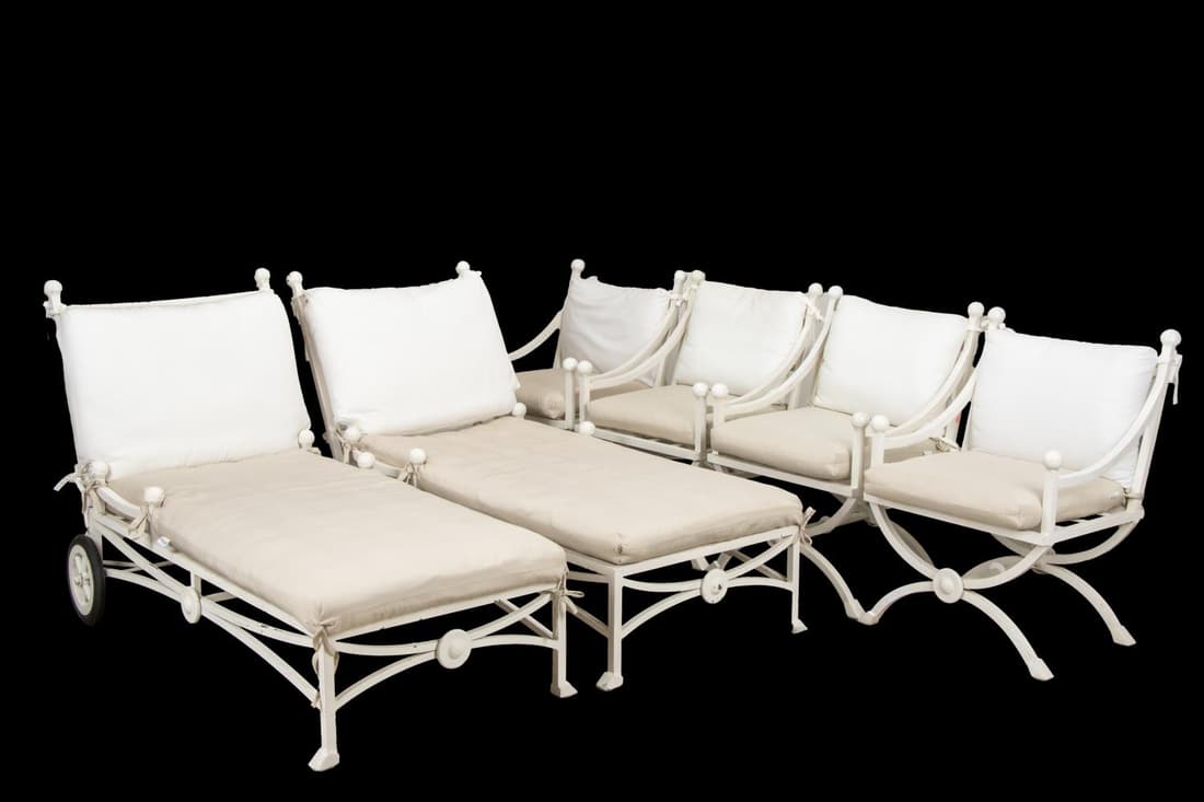 5PC KREISS MYKONOS OUTDOOR FURNITURE: Five piece Kreiss (American 1939) Mykonos cream finished aluminum outdoor furniture group comprising one chaise lounge and four armchairs with cushions, manufacturer's label to the chair cushions Appr