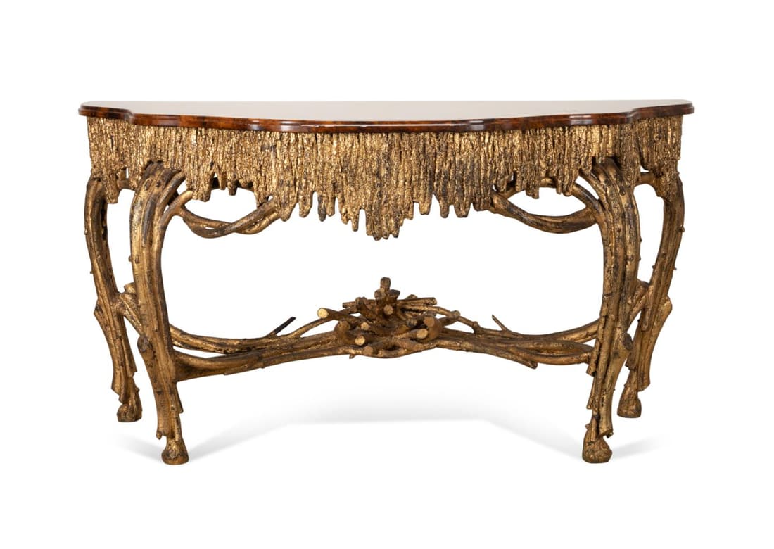 GILDED NATURALISTIC CONSOLE WITH TWIG FORM BASE: Naturalistic bow front console table having a faux burl top and gold finished, composite twig form base, with no apparent marks. Provenance: : From the Private Collection of Steve and Eydie Koonin, At