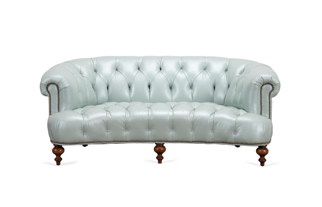 OLD HICKORY TANNERY PRESIDENTIAL LEATHER SOFA: Old Hickory Tannery (American 1972), model 1950 Presidential sofa having Caledonian Sky blue tufted leather upholstery with rolled back and arms, and rising on turned legs, label to the underside. App