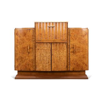 ART DECO BURL WALNUT BAR CABINET, CA 1930: Art Deco burl walnut veneer bar cabinet attributed to Harry and Lou Epstein, London, circa 1930, having a push up and pull down center door opening to a mirrored cocktail prep area with light, above t