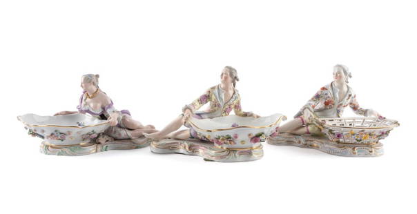THREE FIGURAL MEISSEN SWEETMEAT DISHES, 1815-1924: Group of three figural Meissen (German 1710), porcelain sweetmeat dishes modeled by Johann Joachim Kaendler (German 1706-1775), marks used 1815-1924, comprising a pair of male and female dishes, and a