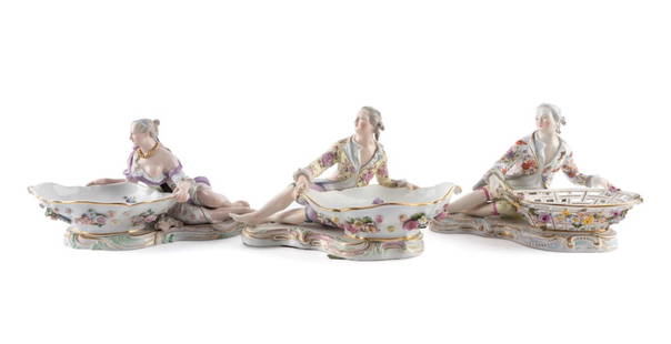 THREE FIGURAL MEISSEN SWEETMEAT DISHES, 1815-1924: Group of three figural Meissen (German 1710), porcelain sweetmeat dishes modeled by Johann Joachim Kaendler (German 1706-1775), marks used 1815-1924, comprising a pair of male and female dishes, and