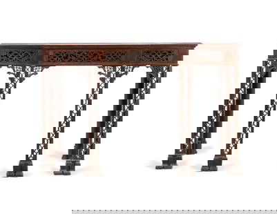 CHINESE CHIPPENDALE MAHOGANY CONSOLE, C. 1900: English mahogany console table in the Chinese Chippendale taste, circa 1900, having a projecting front with pierced apron, and rising on straight pierced legs, apparently unmarked. Approximate dimensi