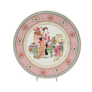 CHINESE EXPORT FAMILLE ROSE ENAMELED PLATE: Chinese Export Famille Rose plate in the Yongzheng taste, centering a scene of a court lady seated in an interior with two young boys holding lotus and peony sprays, the rim decorated with a lozenges