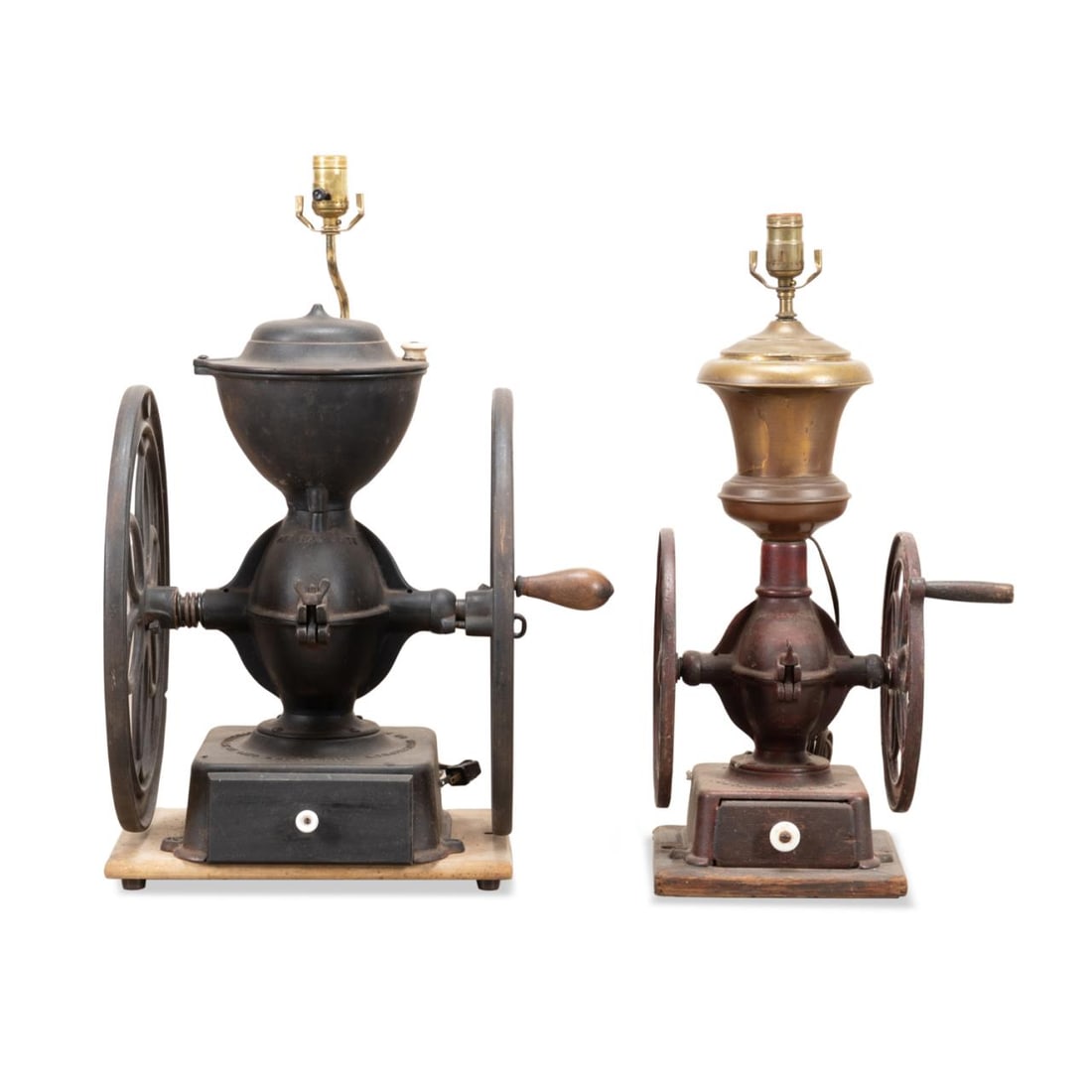 TWO 19TH C. IRON COFFEE MILLS MOUNTED AS LAMPS: Two Enterprise Manufacturing Company (American 1864-1956), cast iron coffee mills, patent date 1873, now mounted as lamps comprising, a large black painted mill and a medium red painted mill, both wit