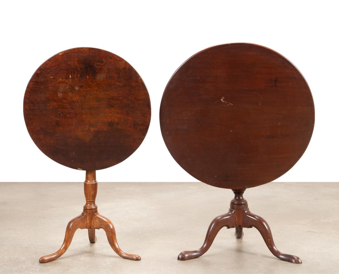 TWO 19TH C. GEORGIAN STYLE TILT-TOP TEA TABLES: Two American and/or English tilt-top tea tables in the Georgian taste, 19th century, comprising an oak table and a mahogany table, both rising on a turned pedestal bases with cabriole legs, apparently