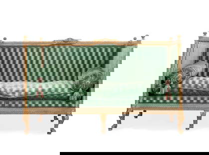 LOUIS XIV STYLE GREEN VELVET ALCOVE SOFA: Manner of Louis Delanois (French 1731-1792), Louis XVI or Transition style carved wood and parcel gilt upholstered alcove sofa, 19th century, with a carved frame having an interlacing motif, striped g