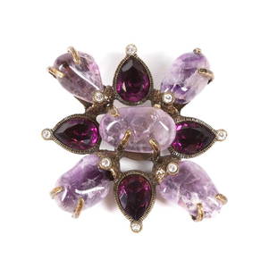 CHANEL AMETHYST MALTESE CROSS BROOCH/PENDANT, 1997: Chanel amethyst Maltese cross brooch/pendant, 1997, having a tumbled amethyst center and arms interspaced with pear shaped faceted glass gems tipped with bezel set crystals, in bronze color metal, wit