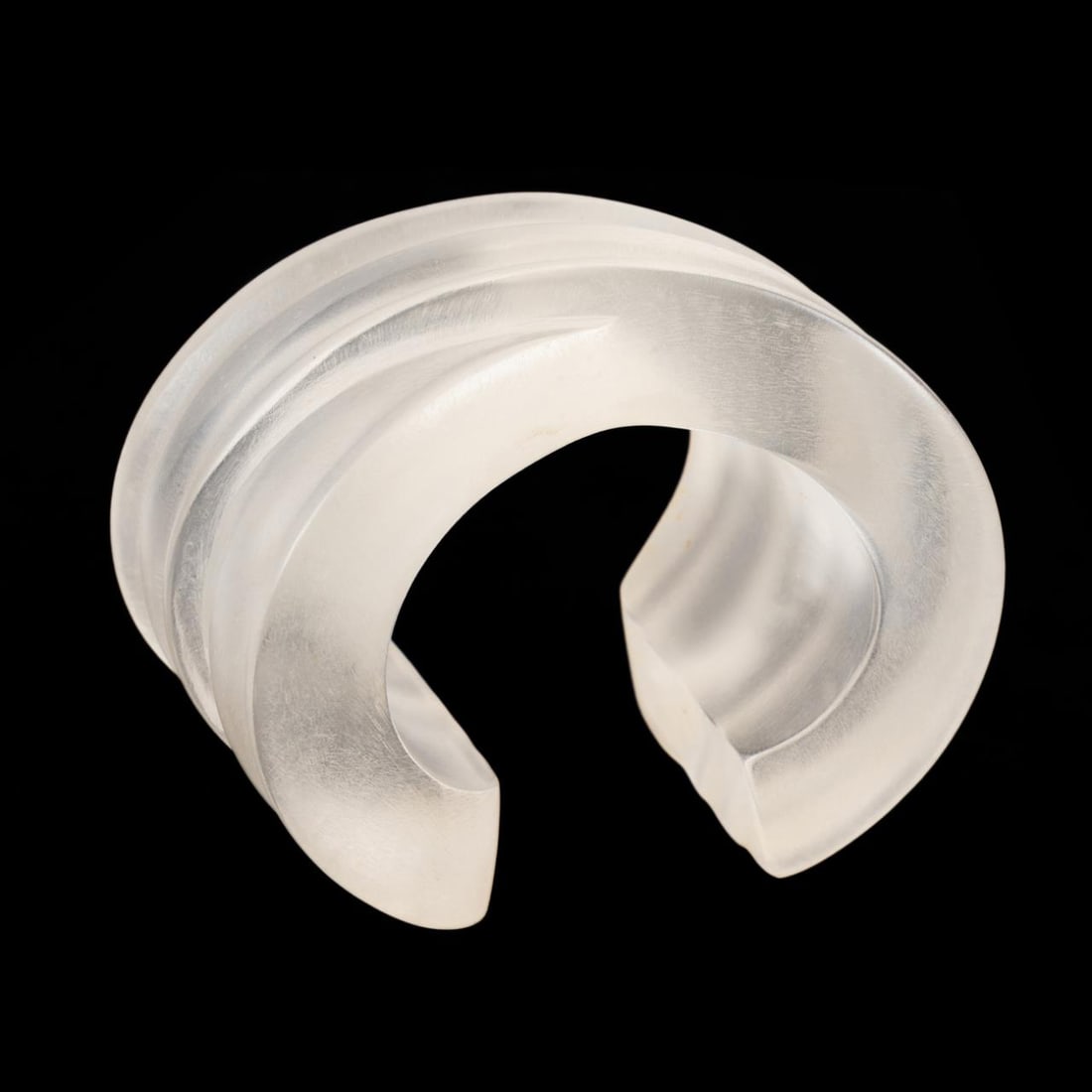 PATRICIA VON MUSULIN CHUNKY SCULPTURAL LUCITE CUFF: Patricia Von Musulin (American b. 1947), frosted lucite 'X' form wide cuff or bracelet, having an etched signature to side. Provenance: From The Estate of Vectra Orkin Barnette, Atlanta, Georgia. Appr