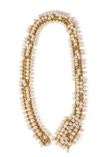 CHRISTIAN DIOR GOLD TONE AND WHITE PEARL BELT: Christian Dior (French), vintage gold tone chain link and faux pearl belt, having hanging movable pearls and a hook latch, with maker's mark to back of faux buckle. Approximate dimensions: l. 28.75",