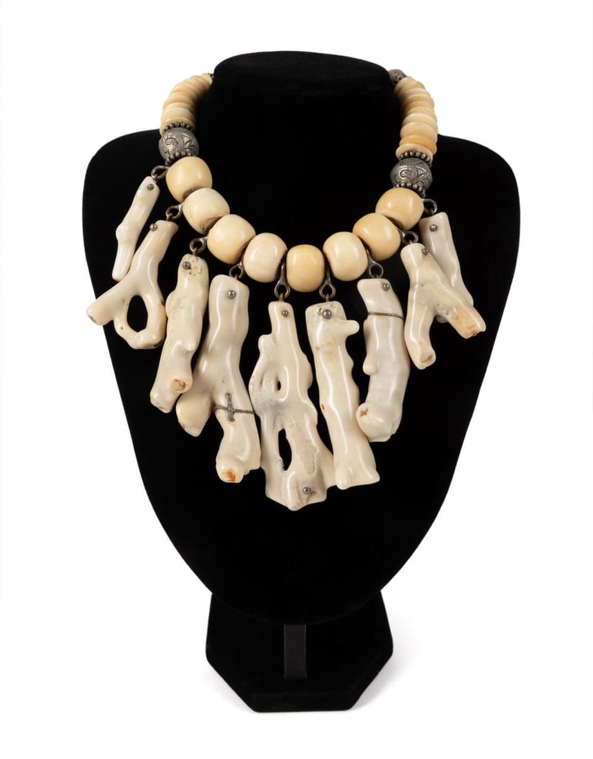 MASHA ARCHER BOHO BONE AND VINTAGE CORAL CHOKER: Masha Archer bone and coral choker composed of discoid and barrel form carved bone beads interspaced with vintage silver beads and suspending eight white branch coral pendants with old wire repairs, h