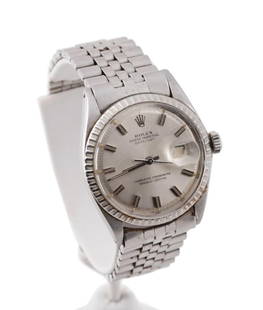 ROLEX STAINLESS STEEL DATEJUST WRIST WATCH, 35MM: Rolex stainless steel Oyster Perpetual Datejust watch, model No.1603, serial No. 106XXXX featuring a Swiss made perpetual movement, silver dial with applied silver stick markers, date aperture, acryli