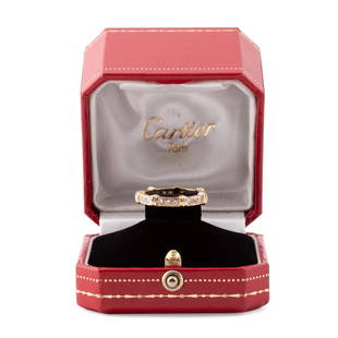 CARTIER DIAMOND AND 18K YELLOW GOLD RING WITH BOX: Cartier (French 1847), diamond and 18k yellow gold and diamond ring, having twenty one (21) round brilliant cut diamonds, of VVS-2 clarity and F color, weighing approximately 0.85ctw, stamped ‘Carti