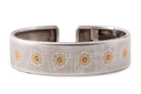 BUCCELLATI 'GEMINATO' STERLING & 18K CUFF BRACELET: Gianmaria Buccellati 'Geminato' 18k yellow gold and sterling silver cuff bracelet with engraved star motif, having a brushed finish and hinge to one side, with maker's mark, Italy, and 925 to