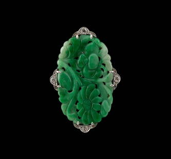 CARVED JADE, DIAMOND & PLATINUM BROOCH: Jade, diamond and platinum brooch, featuring an engraved and pierced 36mm by 24mm open floral jade tablet of light green color, prong set into an open back frame containing four (4) old European cut d