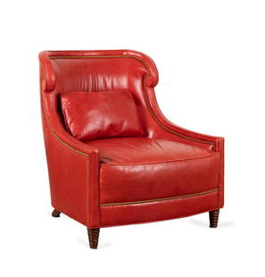 JACQUES GARCIA FOR BAKER LEATHER 'TUILERIES' CHAIR: Jacques Garcia for Baker 'Tuileries' red leather lounge chair with scroll wings, over sloping arms, and nailhead trim, rising on turned spiral legs, with maker's mark to underside. Provenance: From th