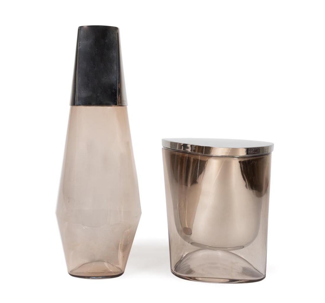 2 JENSEN SMOKY GLASS & STAINLESS WINE ACCESSORIES: Two Thomas Sandell (Swedish b. 1959) for Georg Jensen Living bar and wine accessories, comprising one lidded stainless steel and glass ice bucket and one triangular glass carafe with stainless top, et