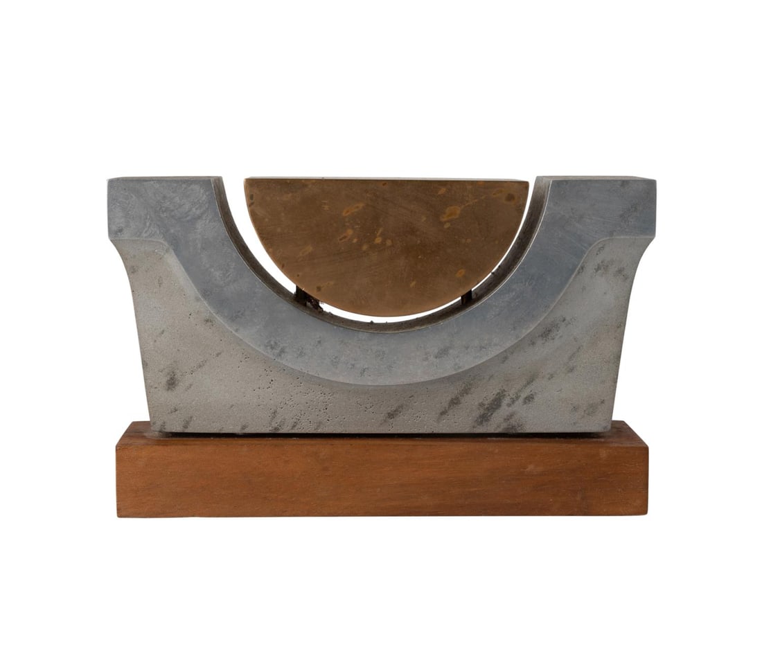 JEFF MESSERSCHMIDT MODERNIST MIXED METAL SCULPTURE: Jeff Messerschmidt (American b. 1949), 'Impact 2000 #1,' 1971, mixed metal sculpture modeled as a half moon of brass or bronze cradled by a block of white metal, the whole resting on a wooden base, si