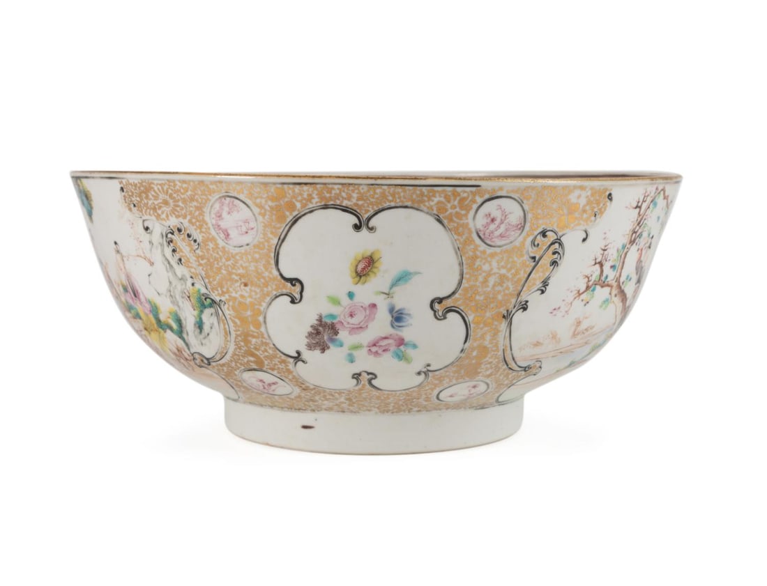 CHINESE EXPORT FAMILLE ROSE AND GILT PUNCH BOWL: Chinese Export Famille Rose and gilt bowl, late 18th to early 19th century, the interior having a Famille Rose floral spray and gilt rim, the exterior having Rococo reserves depicting families enjoyin