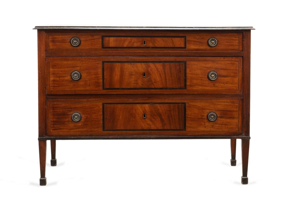 NEOCLASSICAL STYLE FAUX MARBLE THREE DRAWER CHEST: American or European banded mahogany veneer chest in the Neoclassical taste, first half 20th century, having a faux marble overhanging top, three drawers, and rising on tapering legs with block feet, 