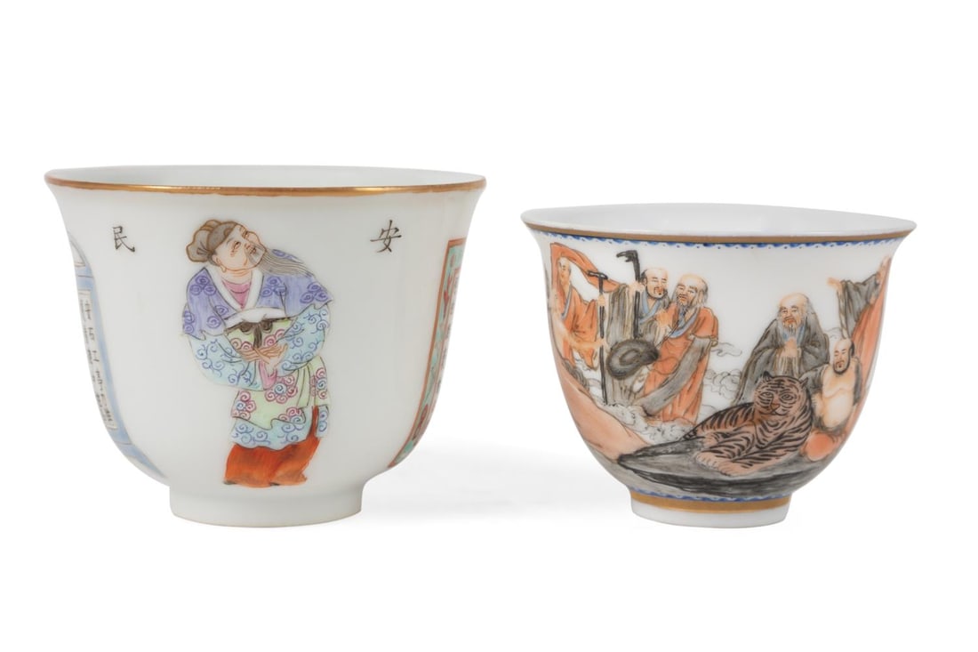 TWO CHINESE FAMILLE ROSE WINE CUPS: Two Chinese Famille Rose wine cups, the first decorated with several louhan and a tiger with a colophon and seal on the back, the second decorated with images from the 'Table of the Peerless Heros' wi
