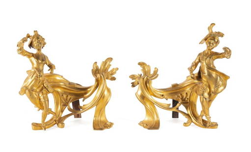 PAIR, LOUIS XV STYLE GILT BRONZE FIREPLACE CHENETS: Manner of Charles Cressent (French, 1685-1768). Pair of Louis XV style gilt bronze sprite figural chenets, early 20th century, with standing male and female figures against rocaille scroll, apparently