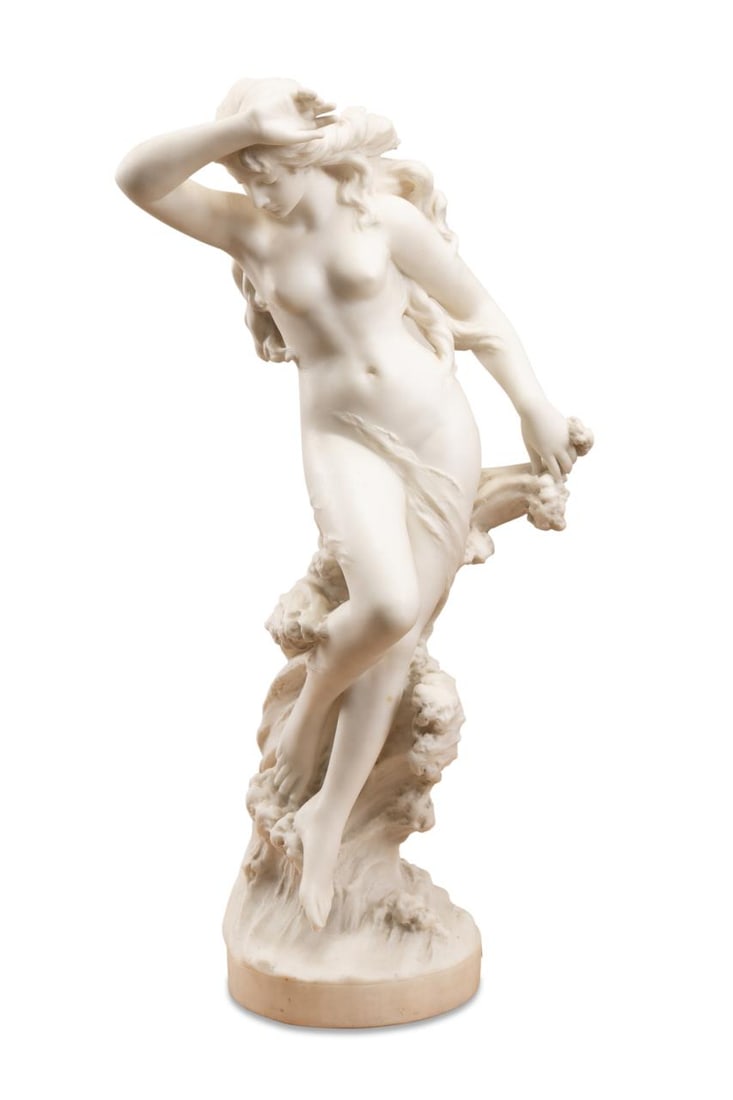 ANTONIO PIAZZA, 'VENUS ON A WAVE', MARBLE: Antonio Piazza (Italian, 1875-1925). 'Venus on a Wave' or 'Nude Beauty' - late 19th to early 20th century, white marble, signed to lower back 'A. Piazza', 'Carrara'. Provenance: The Collection of Dian