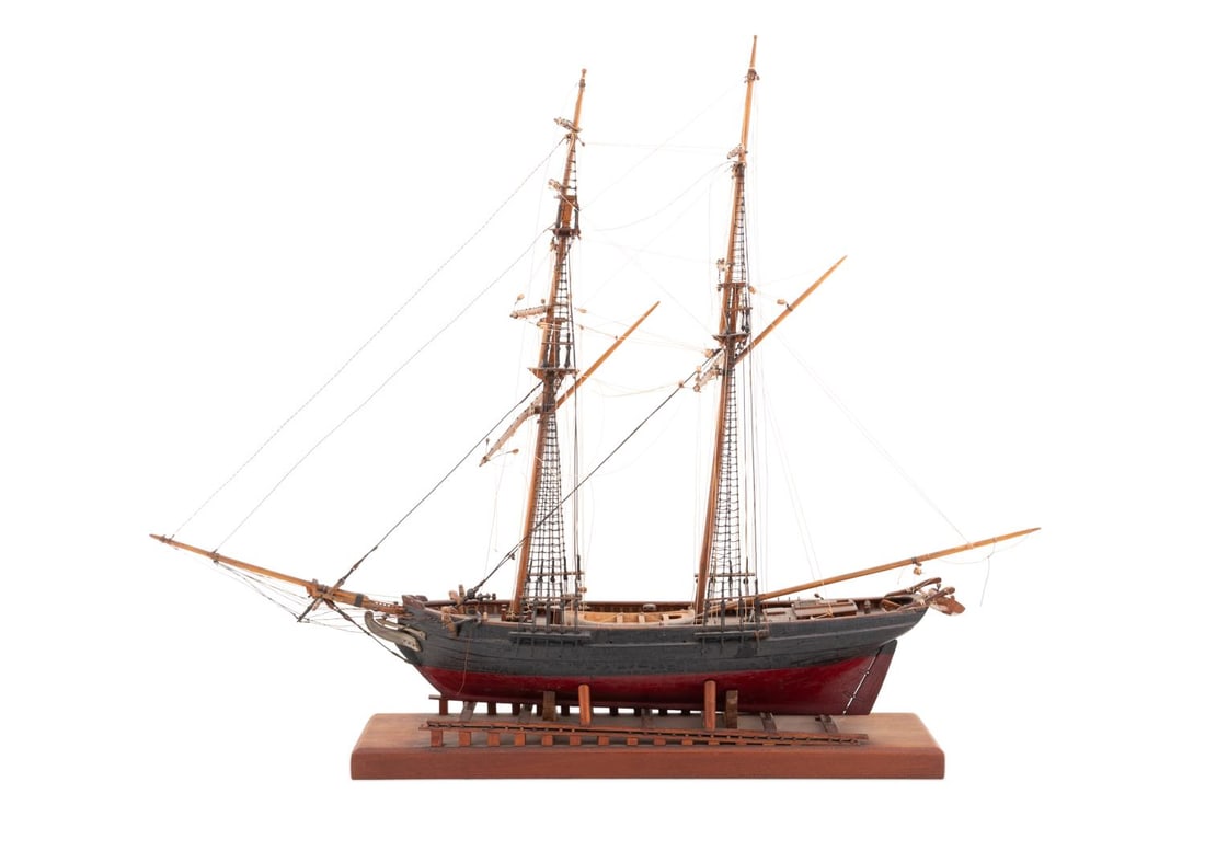 WOODEN THREE MAST SAILING SHIP HANDMADE MODEL: American 20th century. Hand made three mast sailing ship model possibly a Barque complete with riggings, two life boats, one cannon including crows nests on both masts, finished to look like weathered