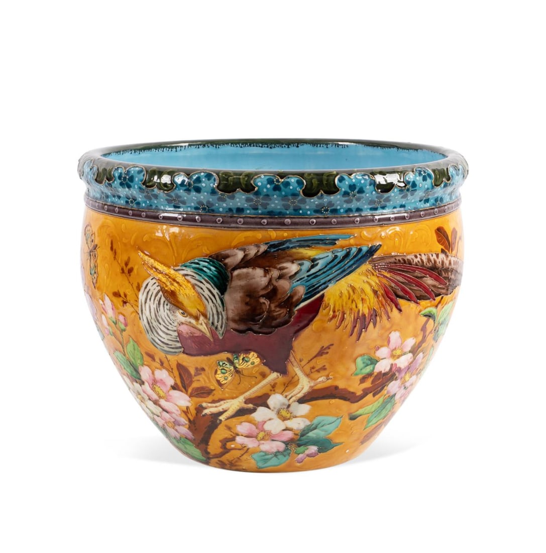 19TH C. LARGE PHEASANT MOTIF FAIENCE JARDINIERE: Manner of Theodore Deck (French, 1823-1891). Large faience earthenware jardiniere or planter, having a floral patterned rim, bright mustard yellow ground with pheasant, butterfly, and dogwood motif, m