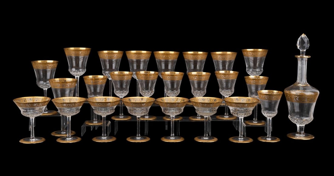 25PCS SAINT-LOUIS 'THISTLE' CRYSTAL STEMWARE: Saint-Louis (French, founded 1586). 25 piece 'Thistle' (pattern introduced 1913) partial table service comprising, 9 water goblets (h. 7.5"), 8 burgundy wine glasses (h. 6.375"), 7 American sherbet/ch