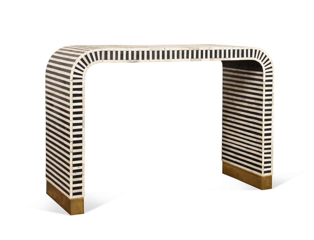 INTERLUDE BLACK & BONE STRIPED WATERFALL CONSOLE: Interlude Home. Beacon Console striped black and white bone waterfall console table, with brass feet, maker's mark to underside. Approximate dimensions: h. 29.75", w. 43.75", d. 16".