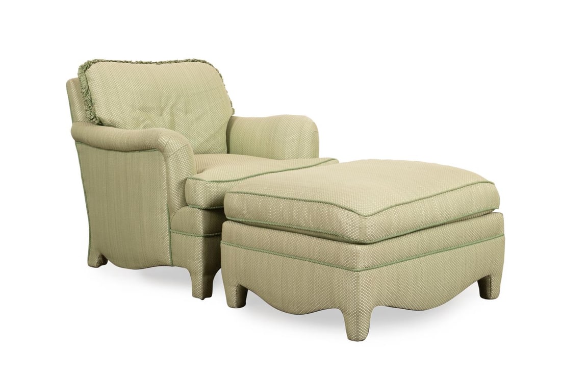 LIGHT GREEN UPHOLSTERED CLUB CHAIR AND OTTOMAN: American. Club chair, having patterned light green upholstery, loose back and seat cushion, and rising on bracket feet, together with a matching ottoman, apparently unmarked. Provenance: Private Colle