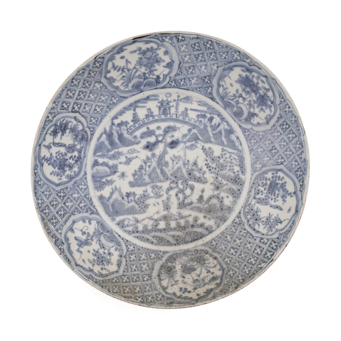 LARGE CHINESE BLUE AND WHITE CHARGER: Chinese, 19th century. Large blue and white charger with floral cartouches and lattice patterns, apparently unmarked. Approximate dimensions: h. 4", dia. 17.75".