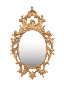 ITALIAN ROCOCO STYLE OVAL GILTWOOD MIRROR
