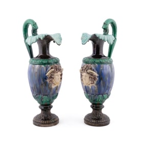 PAIR, LARGE FRENCH FAIENCE FACIAL MASK EWERS
