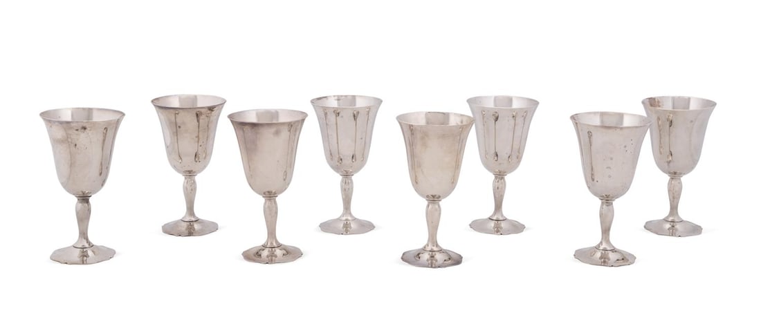 SET OF 8 WALLACE 'ANTIQUE' STERLING WATER GOBLETS: Wallace Silversmiths (American, founded 1871), 20th century. Set of eight "Antique" (pattern active 1926-1980) sterling silver water goblets (shape 3638), all appropriately marked. Note: Credit card p
