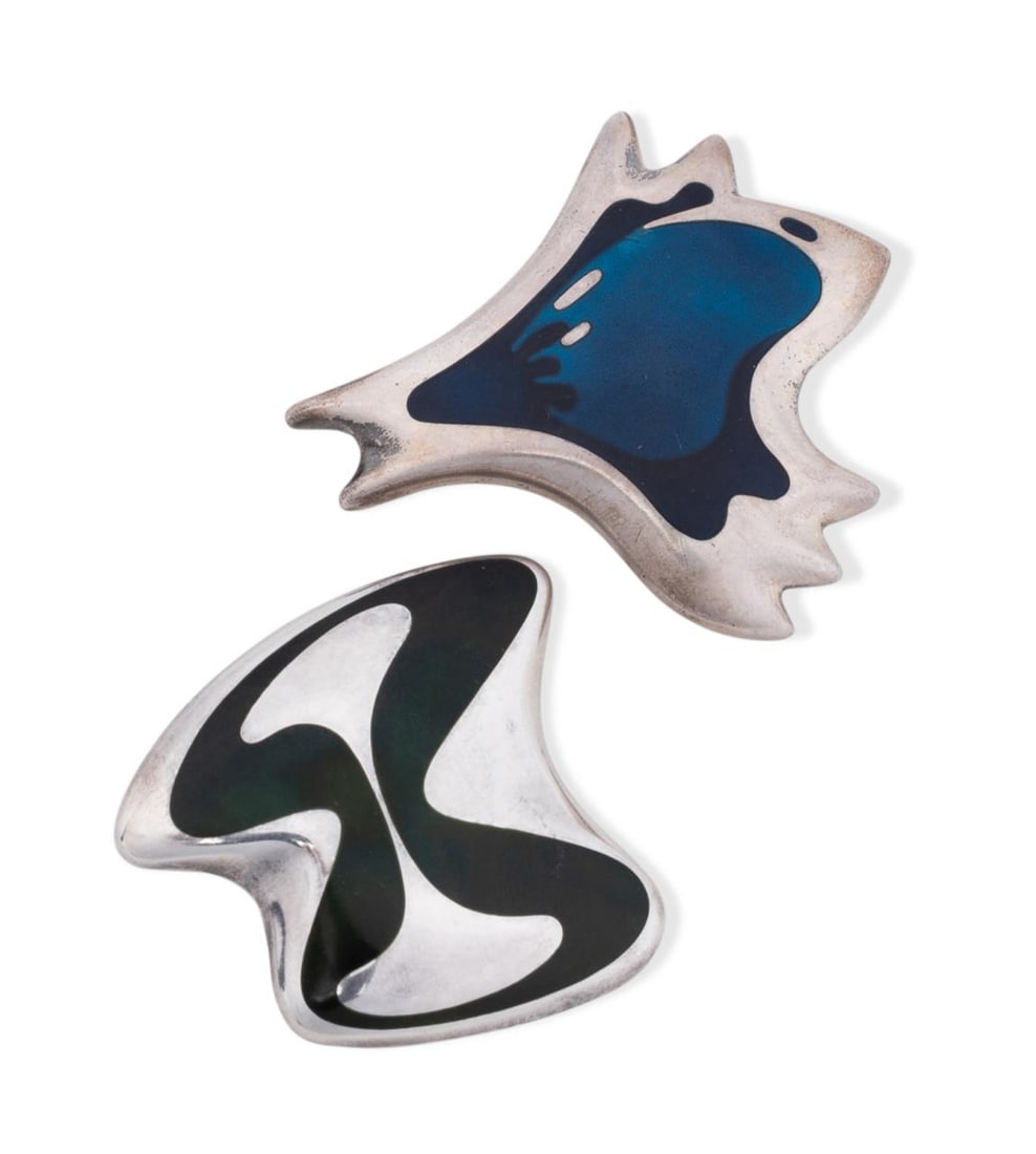 2 HENNING KOPPEL FOR GEORG JENSEN ENAMEL BROOCHES: Henning Koppel (Danish, 1918-1981) for Georg Jensen (Danish, founded 1904). Two modernist sterling silver and enamel pins, comprising model numbers 306 in blue and 315 in black, both having maker's ma