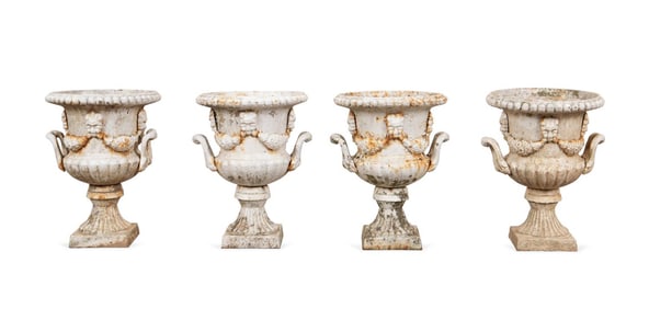 SET OF FOUR CLASSICAL STYLE IRON GARDEN URNS