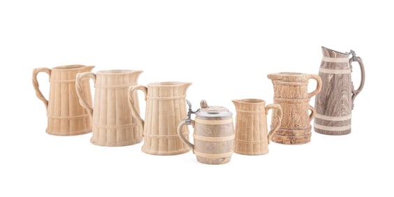 SEVEN FAUX BOIS JUGS AND TANKARDS, INCL. VILLEROY