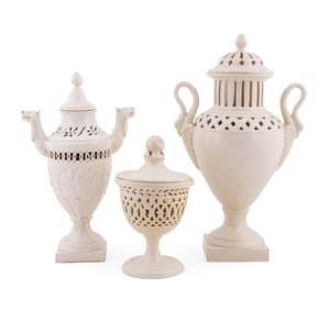 THREE RETICULATED CREAMWARE URNS, 19TH C.