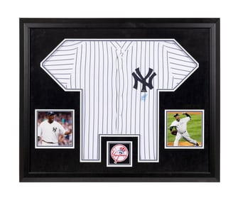 C.C. SABATHIA SIGNED FRAMED JERSEY AND PHOTOS COA