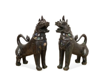 PAIR OF LARGE BRONZE LIONS, MANNER TONY DUQUETTE