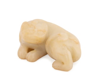 CARVED YELLOW JADE FIGURE OF A MYTHICAL BEAST