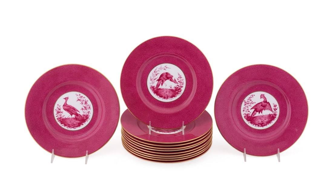 SET OF 12 SPODE FUSCIA EXOTIC BIRD SERVICE PLATES: Spode (English, founded 1770), first half 20th century. Set of twelve bone china service plates, pattern R9226, having a powdered fuschia pink lip centering on hand-painted exotic birds in various pos