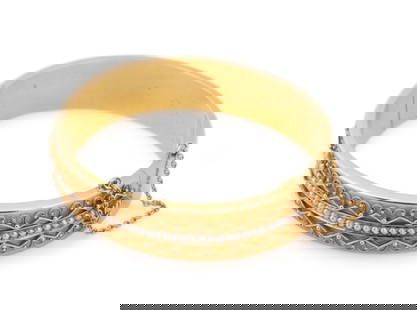 EDWARDIAN SEED PEARL BANGLE BRACELET SET IN 15K YG: English, early 20th century. Edwardian wirework bangle bracelet with (46) white bodied seed pearls (2mm), with tension clasp and safety chain. Set in 15k yellow gold. Finesse marks. Approx dimensions: