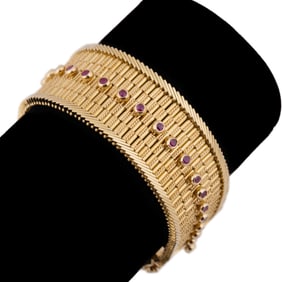 MODERNIST RUBY BRACELET SET IN 18K YG