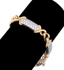 TIFFANY & CO. DIAMOND BRACELET SET IN 18K & PLAT.