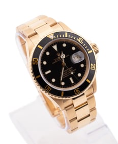 ROLEX 18K YG AND BLACK SUBMARINER WRIST WATCH 40MM
